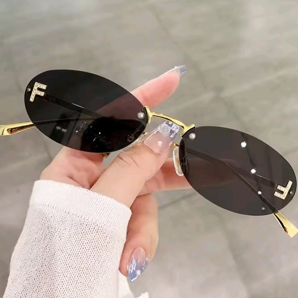 Elegant Black and Gold Sunglasses
